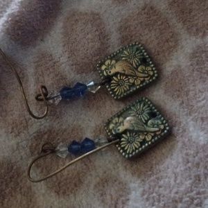 Metal and crystal pigeon earrings